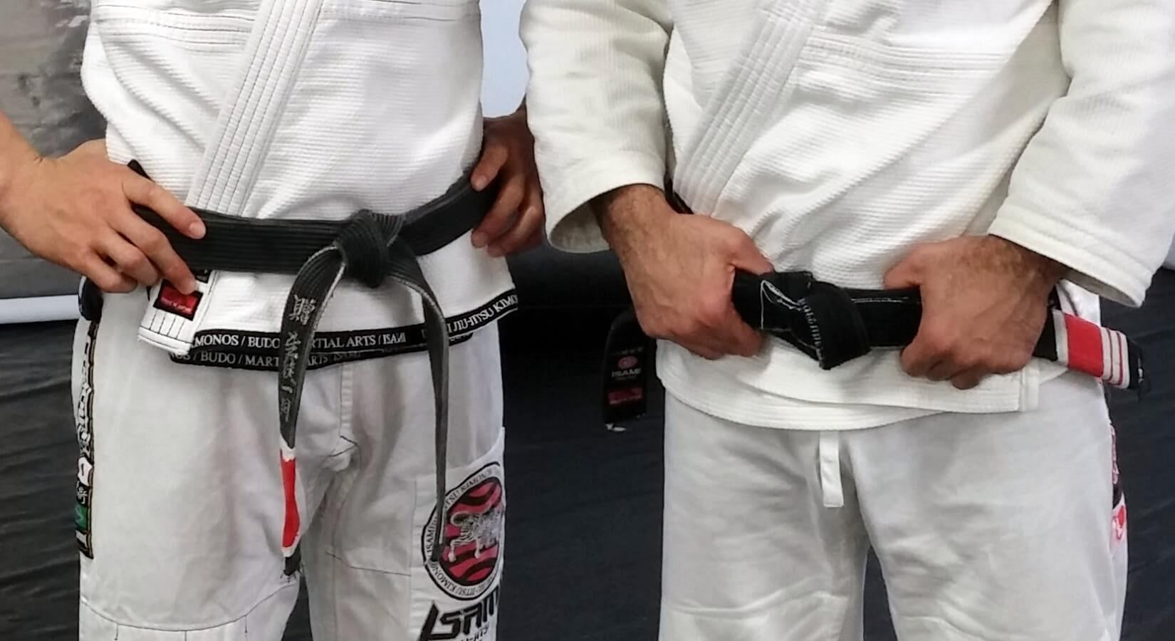 What does the rank bar on a BJJ belt mean?