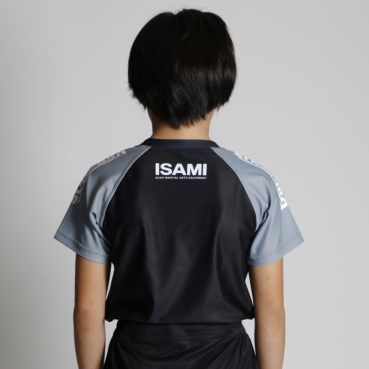 Isami Kids BJJ Rash Guard Grey on model, back