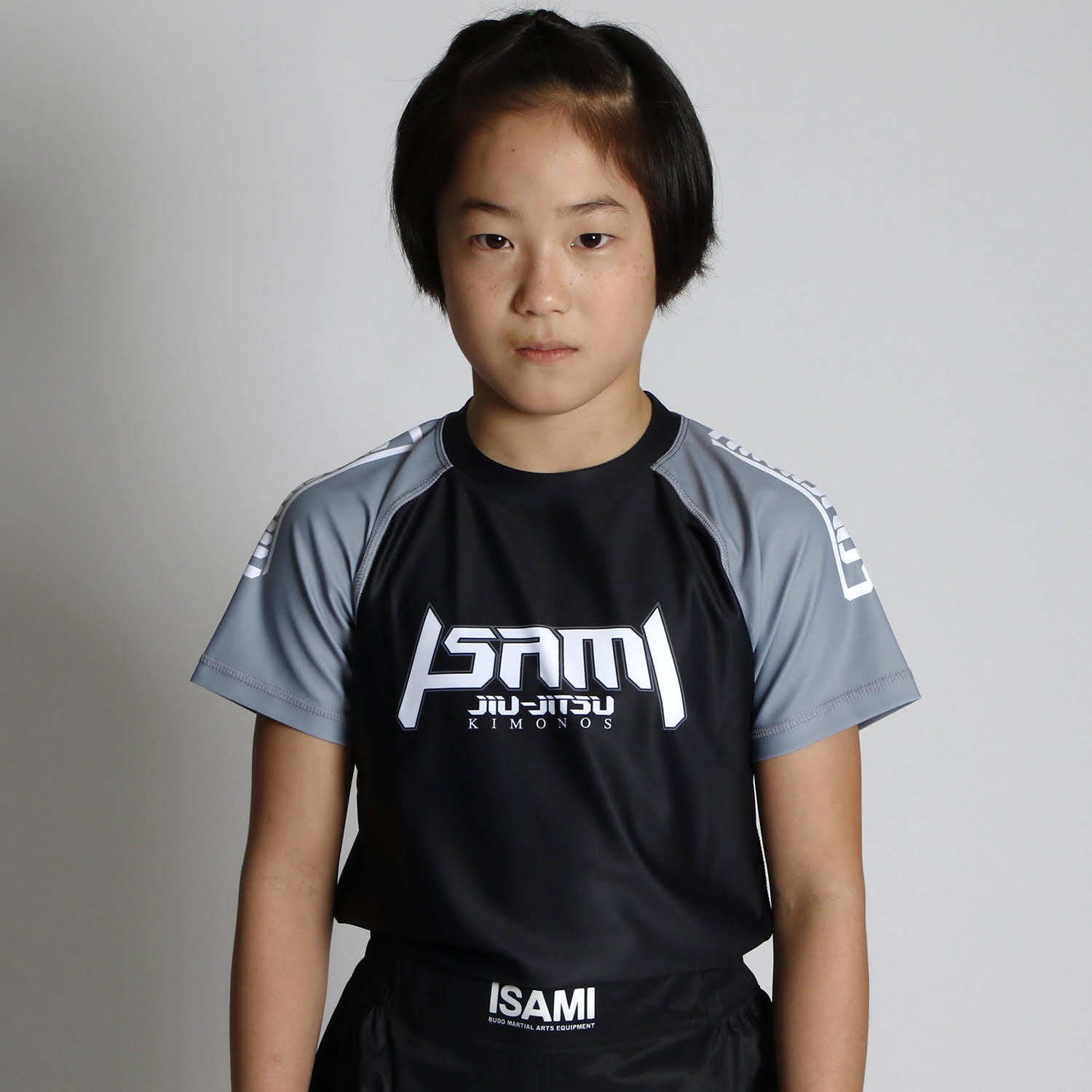 Isami Kids BJJ Rash Guard Grey on model, front