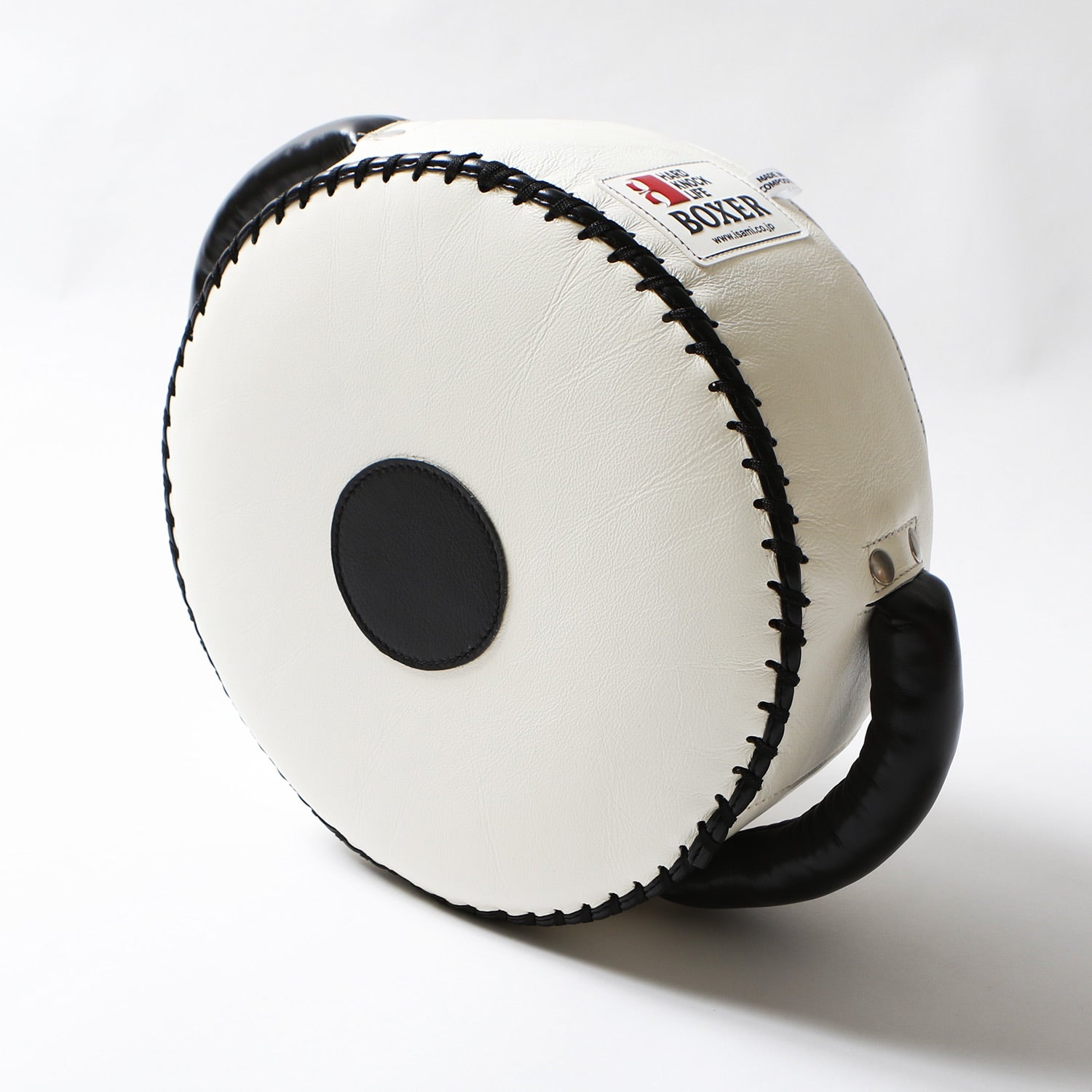 Isami Round Punch Shield Mini – flat lay