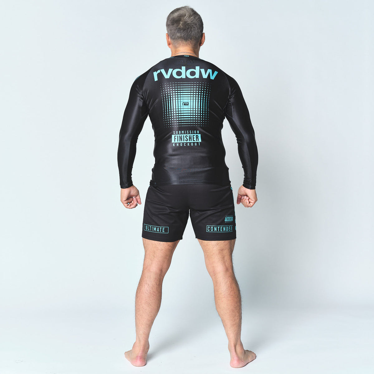 Reversal RVDDW Racing Fight Shorts – Black-Turquoise – model shot