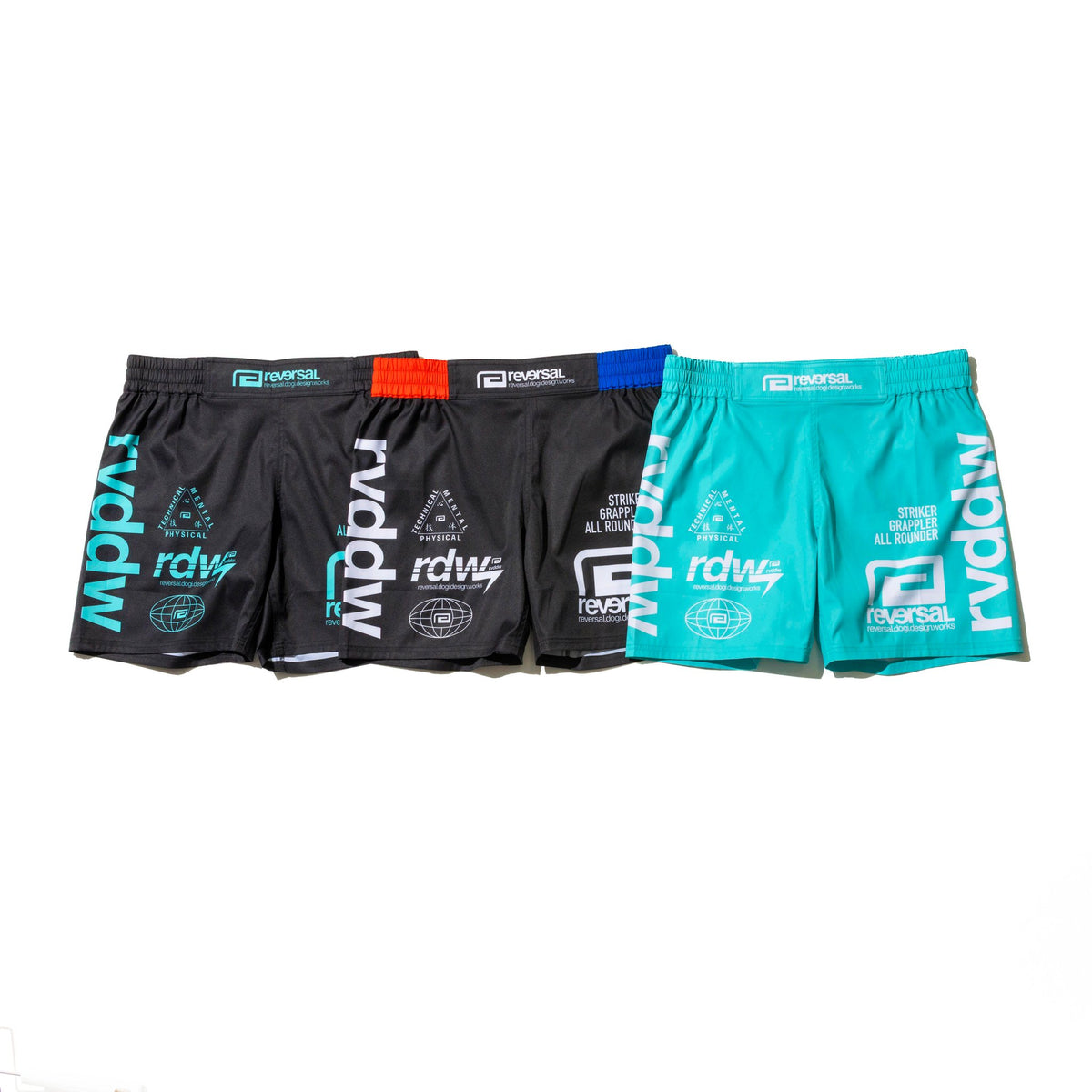 Reversal RVDDW Racing Fight Shorts – Black, Black-Turquoise and Turquoise – flat lay